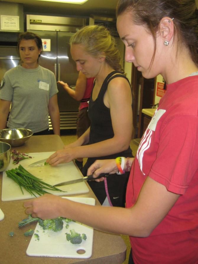 Preparing a meal for shelter residents
